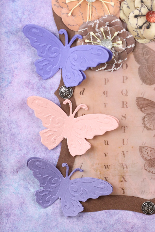 Embossed butterflies and floral wall hanging