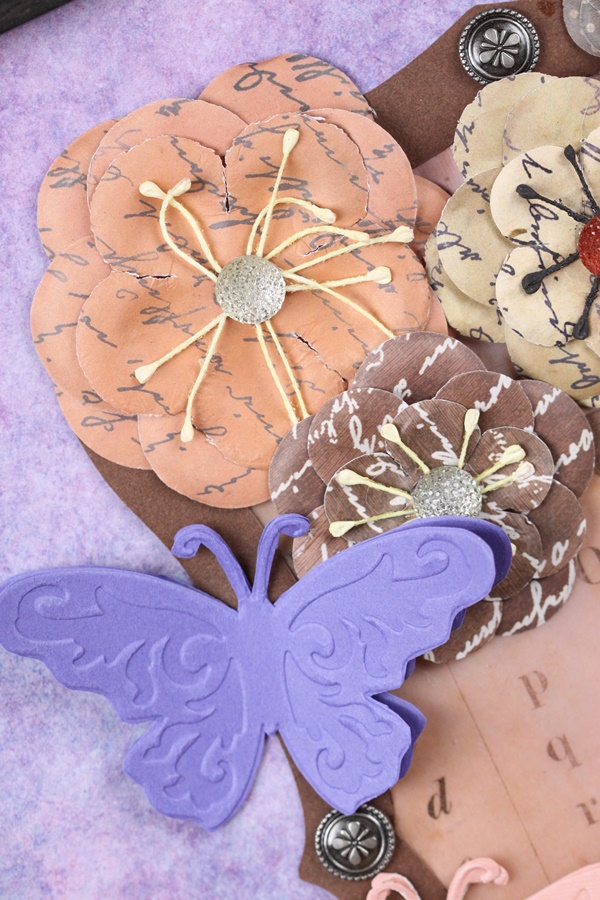 Embossed butterfly and floral wall hanging