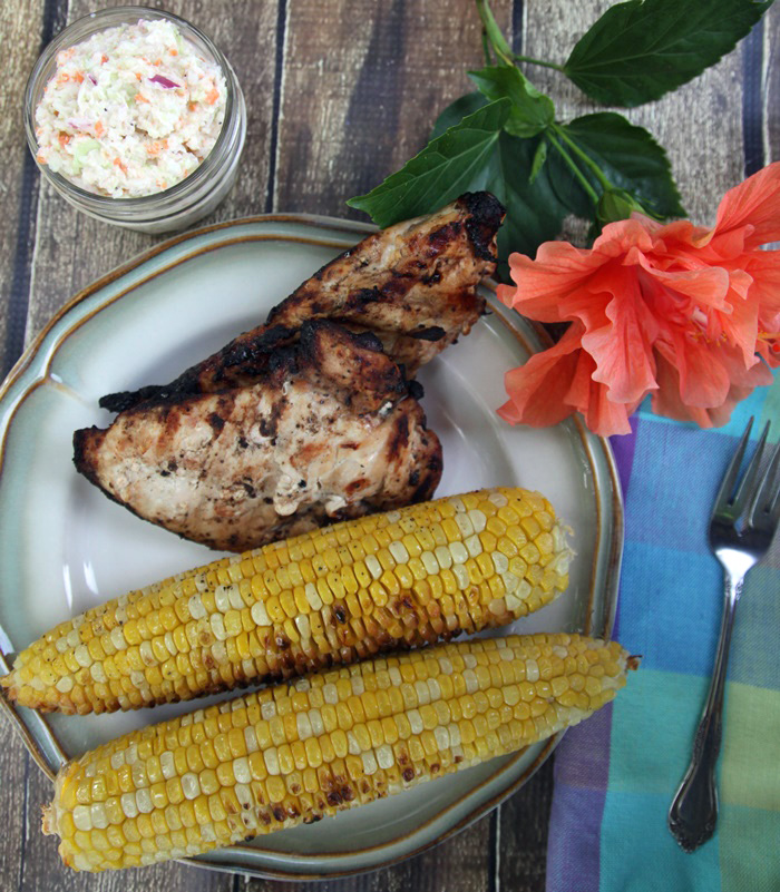 coleslaw corn on the cob and Italian marinated chicken on the grill